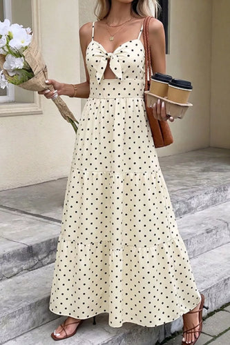 Robe longue à pois, avec liens à nouer et découpes