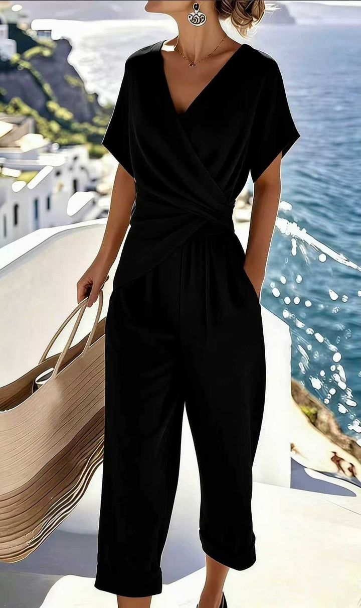 Damen Eleganter Jumpsuit mit Wickeloptik und breiten Beinen