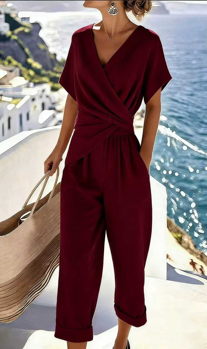 Damen Eleganter Jumpsuit mit Wickeloptik und breiten Beinen