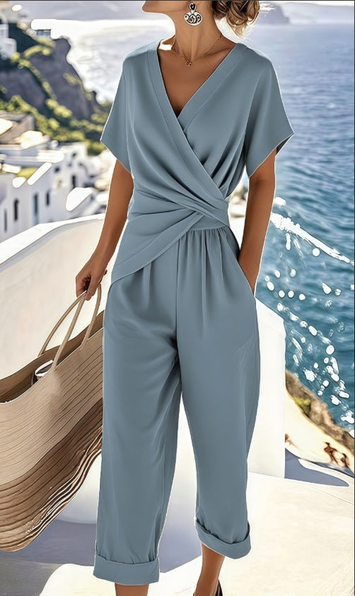 Damen Eleganter Jumpsuit mit Wickeloptik und breiten Beinen