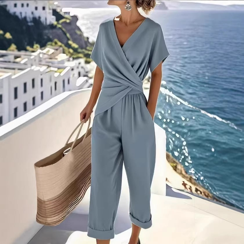 Damen Eleganter Jumpsuit mit Wickeloptik und breiten Beinen