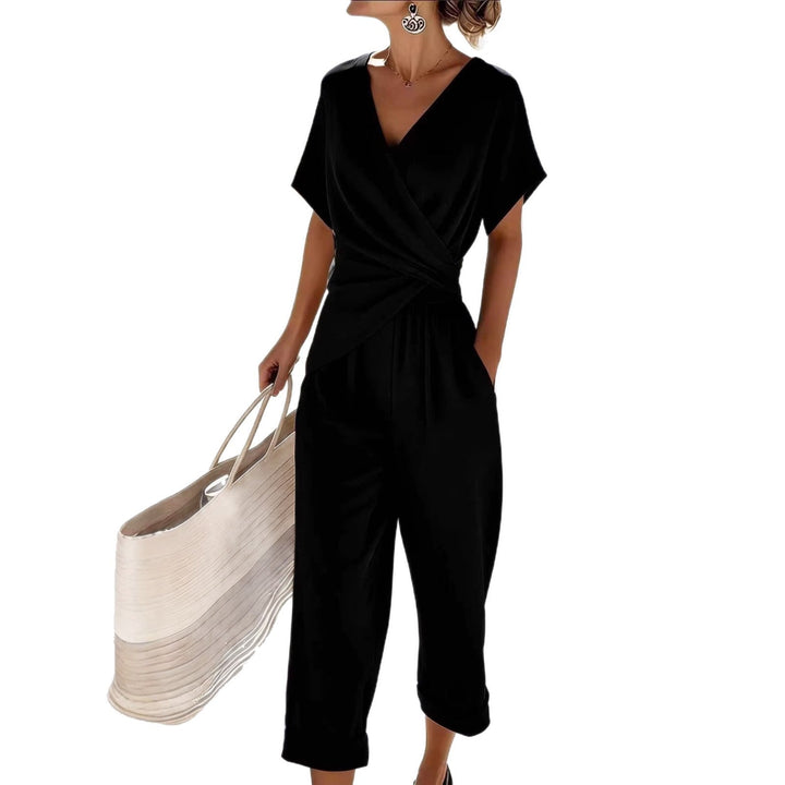 Damen Eleganter Jumpsuit mit Wickeloptik und breiten Beinen